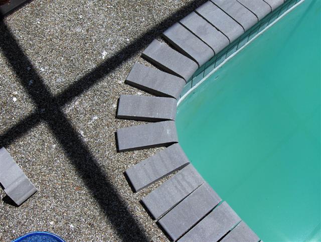 Installing curved pool coping