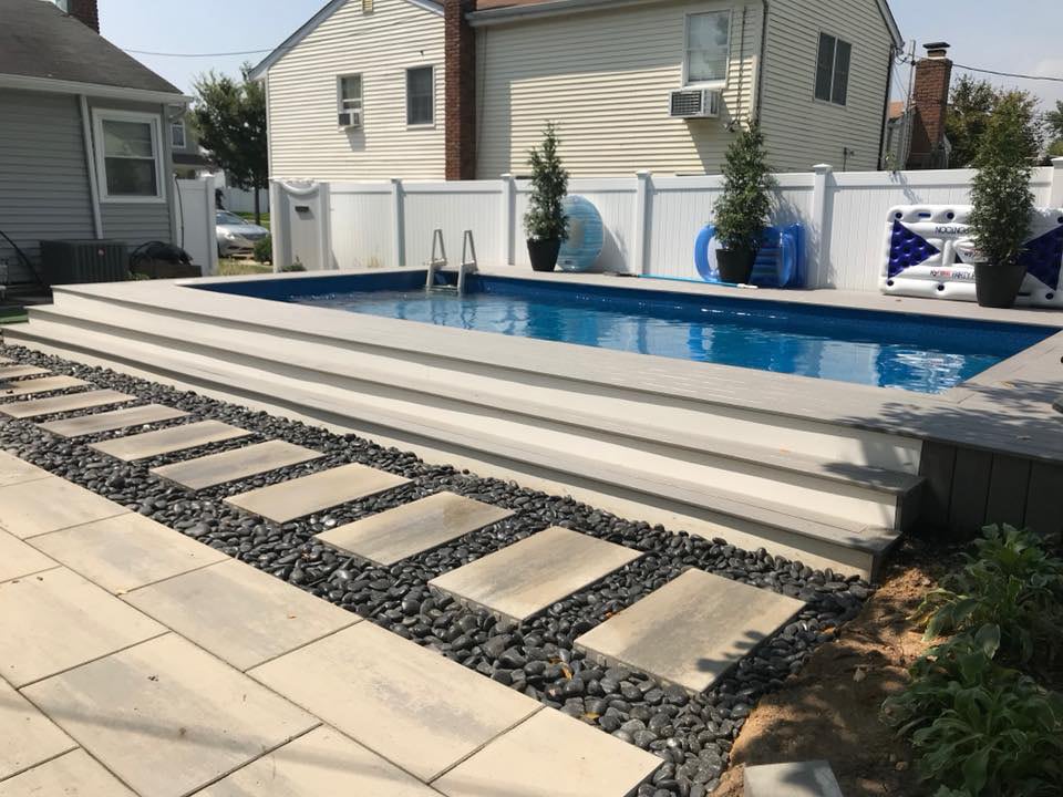 above ground pool with paver deck